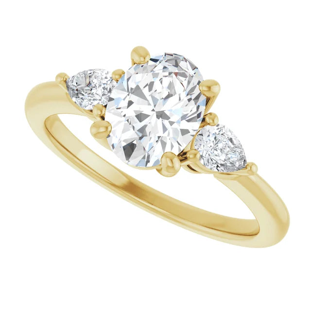1 1/4 CTW Three Stones Oval and pear Diamond Engagement Ring in Yellow gold