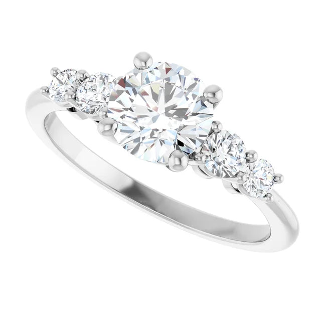 five-stone diamond ring with claw prongs and polished gold band set in Platinum