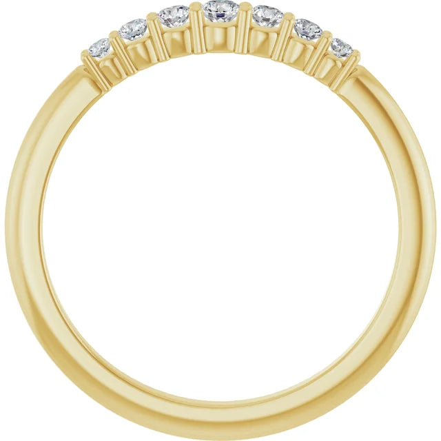 Gold ring with small diamonds on a white background