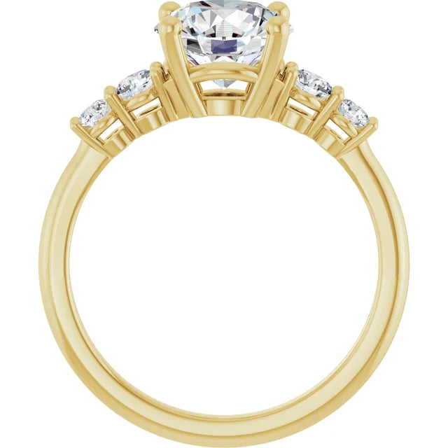 five-stone diamond ring with claw prongs and polished gold band in yellow gold showing diamond from the side