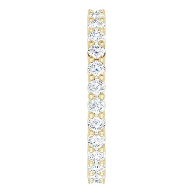 2MM Full Eternity Diamond Wedding Band for women set in yellow gold showing diamond on shank
