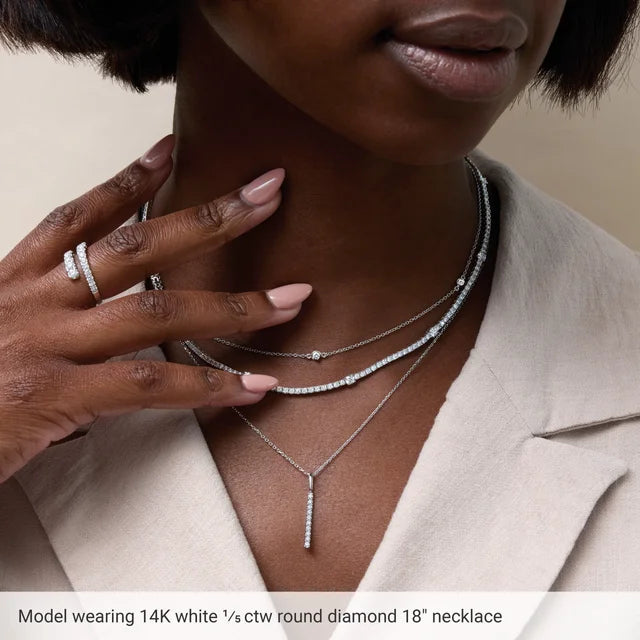 Model wearing 3-Stone Diamond Station Necklace
