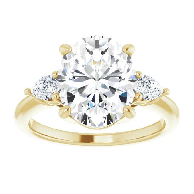 1 1/4 CTW Three Stones Oval and pear Diamond Engagement Ring in Yellow Gold