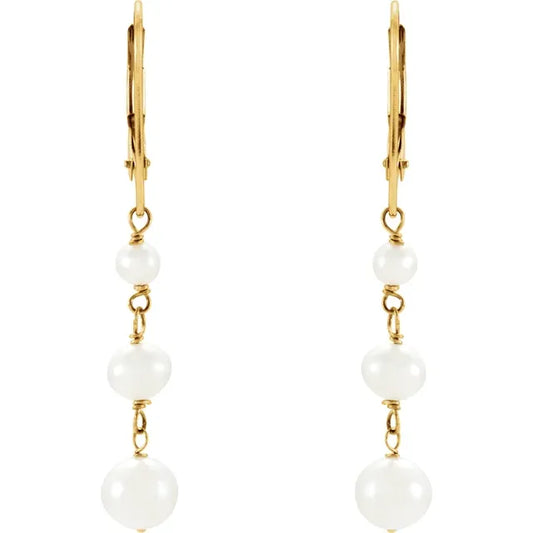 side picture of White Freshwater Pearl Earrings / 14K Yellow Gold Dangle Earrings