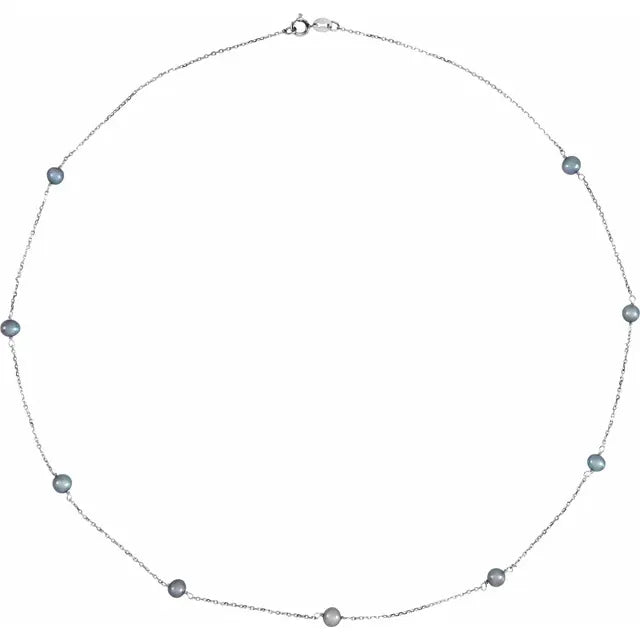 Close-up of 14K white gold black freshwater pearl station necklace – Jordan Design Jewelry