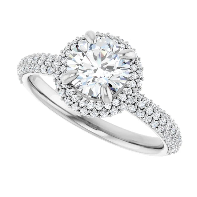 Double halo round diamond engagement ring with claw prongs and bead-set accent diamonds in Platinum