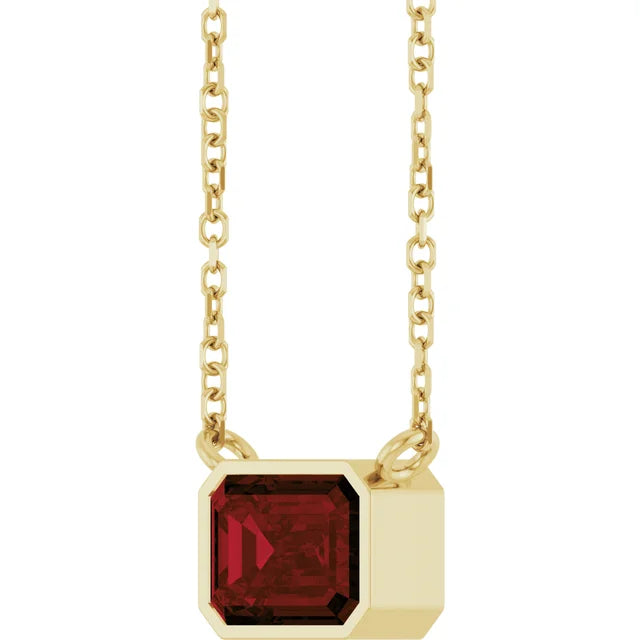 Side view for Yellow goldGarnet Bezel Set Emerald Cut Birthstone Pendant