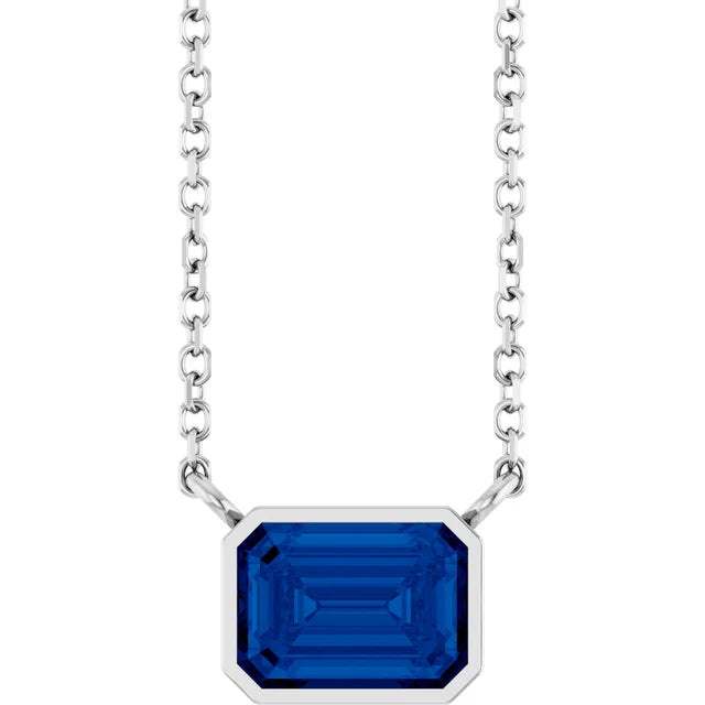 White Gold Bezel Set Emerald Cut Blue Sapphire Birthstone Solitaire Necklace