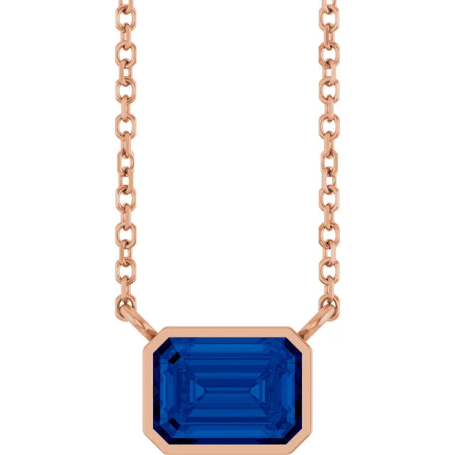 Rose Gold Bezel Set Emerald Cut Blue Sapphire Birthstone Solitaire Necklace
