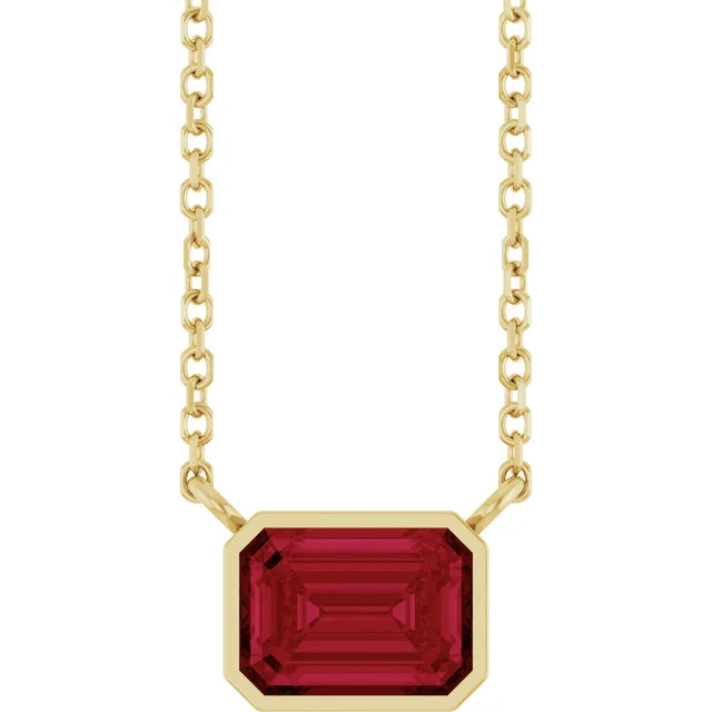 Yellow Gold Bezel Set Emerald Cut Ruby Birthstone Solitaire Necklace