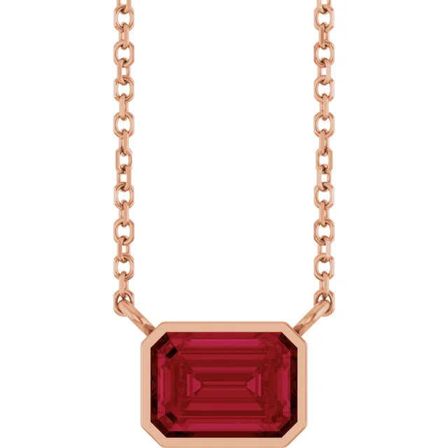 Rose Gold Bezel Set Emerald Cut Ruby Birthstone Solitaire Necklace
