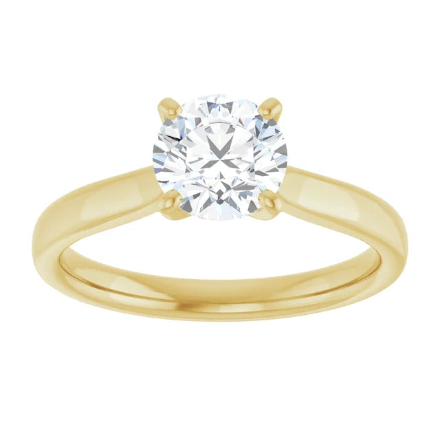 Classic 4-prong round solitaire engagement ring in 14K Yellow gold with a 1 carat diamond, timeless Tiffany-style design.