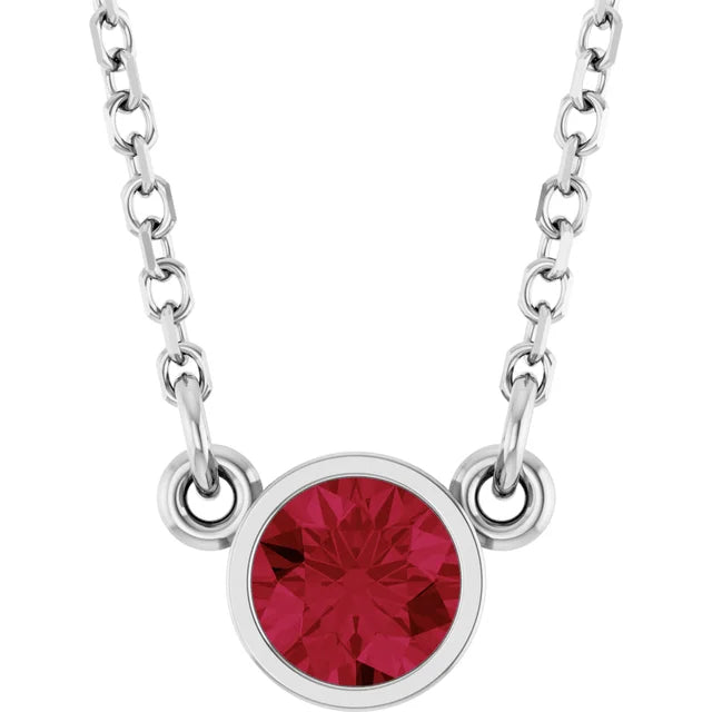 Ruby Birthstone Bezel Set Solitaire Necklace in white gold