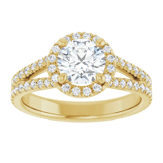 Round diamond engagement ring with French-set accents and a split shank band