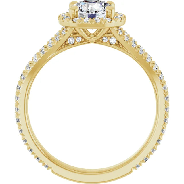 Round diamond engagement ring with French-set accents and a split shank band set in Yellow Gold showing under gallery