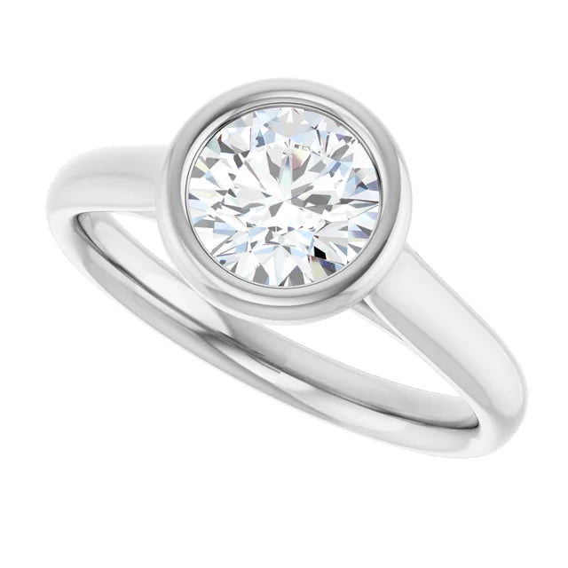 Bezel Set Round Diamond Engagement Ring set in Platinum