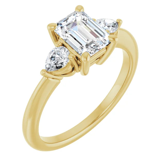Side picture showing shank and diamond for 1 CT three Stones Emerald and Pear Three Stone Diamond Engagement Ring set in Yellow Gold