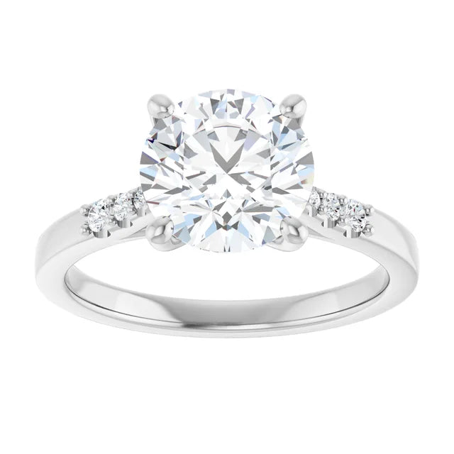 2 Round diamond engagement ring with tapered natural diamond accents in Yellow gold sideway picture showing diamonds on the band in White Gold