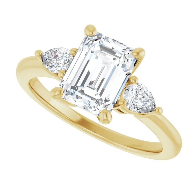 2 CT three Stone Diamond engagement Ring with Emerald Center Stone and two pear Side Stones Set in yellow gold