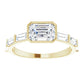 Emerald Cut Diamond engagement ring Yellow gold showing center stone 