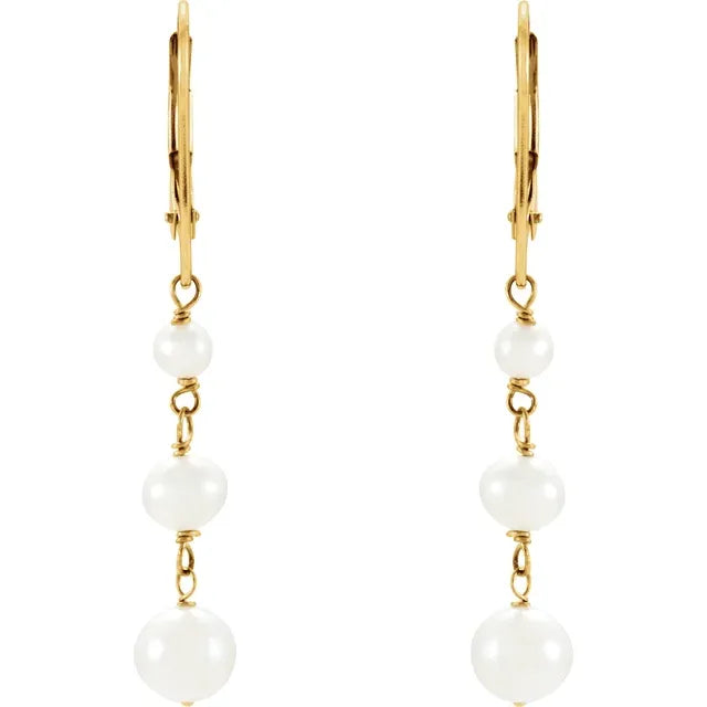 side picture of White Freshwater Pearl Earrings / 14K Yellow Gold Dangle Earrings