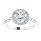 Vintage-inspired round diamond halo engagement ring with petal-accented shank set in white Gold
