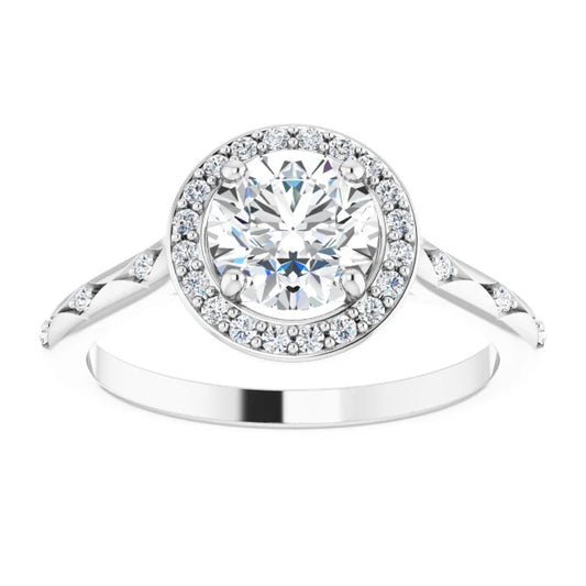 Vintage-inspired round diamond halo engagement ring with petal-accented shank set in white Gold
