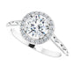 Vintage-inspired round diamond halo engagement ring with petal-accented shank set in platinum