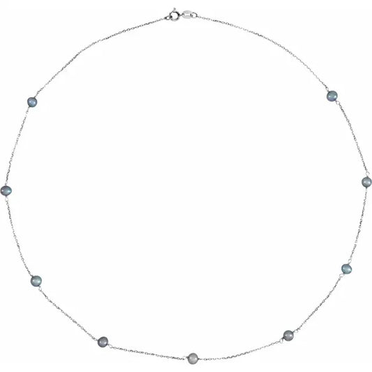 Close-up of 14K white gold black freshwater pearl station necklace – Jordan Design Jewelry