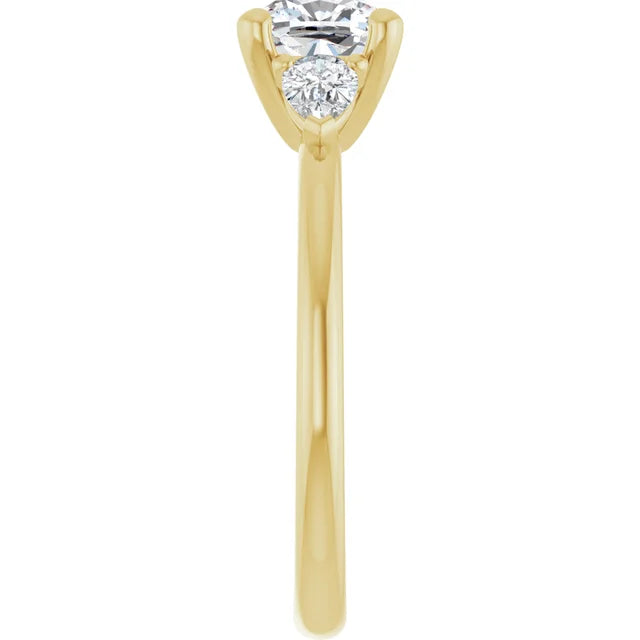1 CT Cushion & Pear three Stone Diamond Engagement Ring Set in yellow gold showing shank from the side 