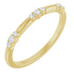 Gold ring with diamonds on a white background