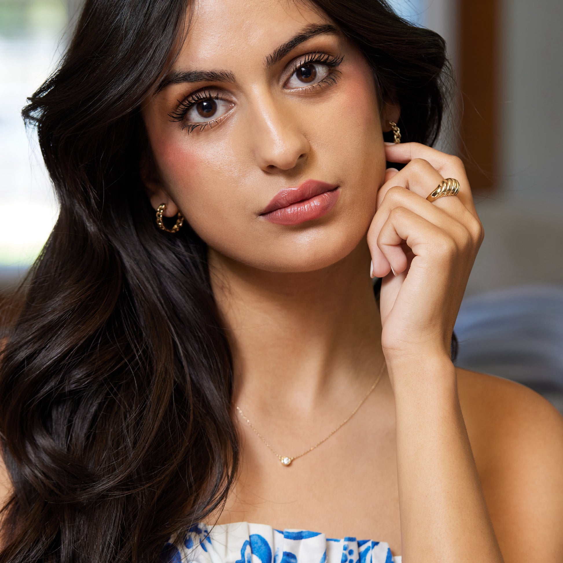 Model Wearing Dome ring and dome earrings 