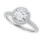 Double halo round diamond engagement ring with claw prongs and bead-set accent diamonds in Platinum