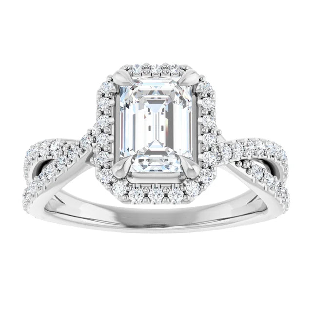 Halo Style Emerald Cut Diamond Engagement Ring with Twisted Shank Set in white gold or platinum 