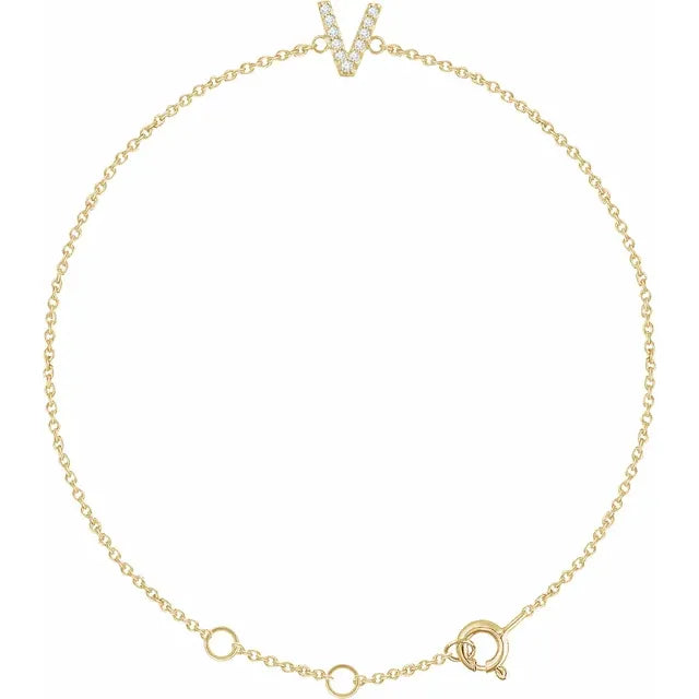 Delicate pavé diamond initial letter V bracelet in solid 14K yellow gold chain 