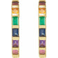 Gold hoop earrings with colorful gemstones on a white background