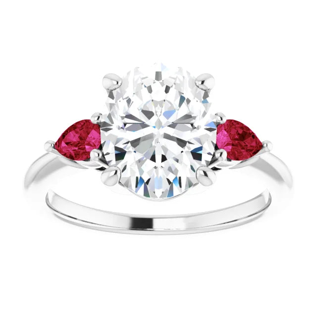 three Stone Oval Diamond and Pear Rubies Side Stone Diamond Engagement Ring showing center Stone
