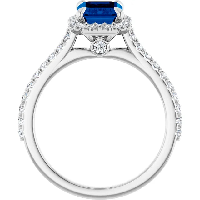 Emerald Cut Natural sapphire and Natural Diamond Halo Style Engagement Ring showing under gallery 