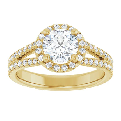 Round diamond engagement ring with French-set accents and a split shank band