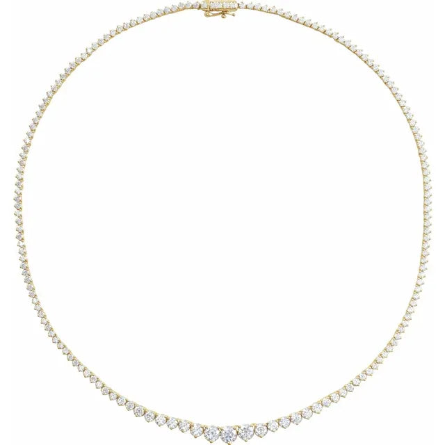 Detail of diamond graduation on tennis necklace in yellow gold