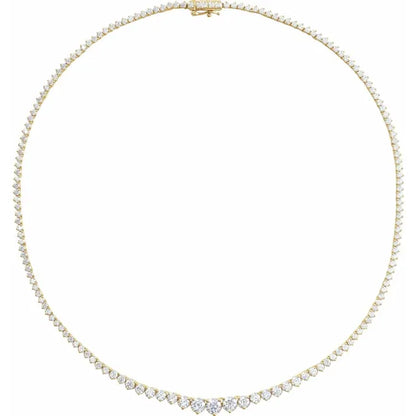 Detail of diamond graduation on tennis necklace in yellow gold