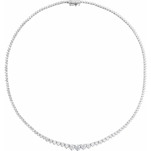 Detail of diamond graduation on tennis necklace in white gold