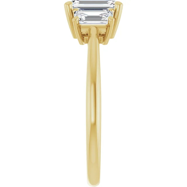 3-Stone Emerald Cut Diamond engagement Ring for Women set in Yellow gold showing shank from the side 