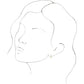 Model wearing 14k Gold Hoop Earrings yellow gold 10 MM