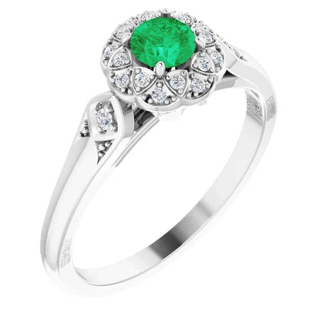 platinum emerald engagement ring 