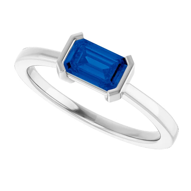 Emerald Cut Natural Blue Sapphire Solitaire Ring on platinum