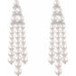 women peal earrings 