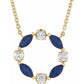 14K Yellow gold open circle pendant necklace with alternating blue sapphires and natural diamonds

